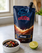 KneadSG Sambal Kicap pouch beside a bowl of dark sweet-soy sambal for dipping